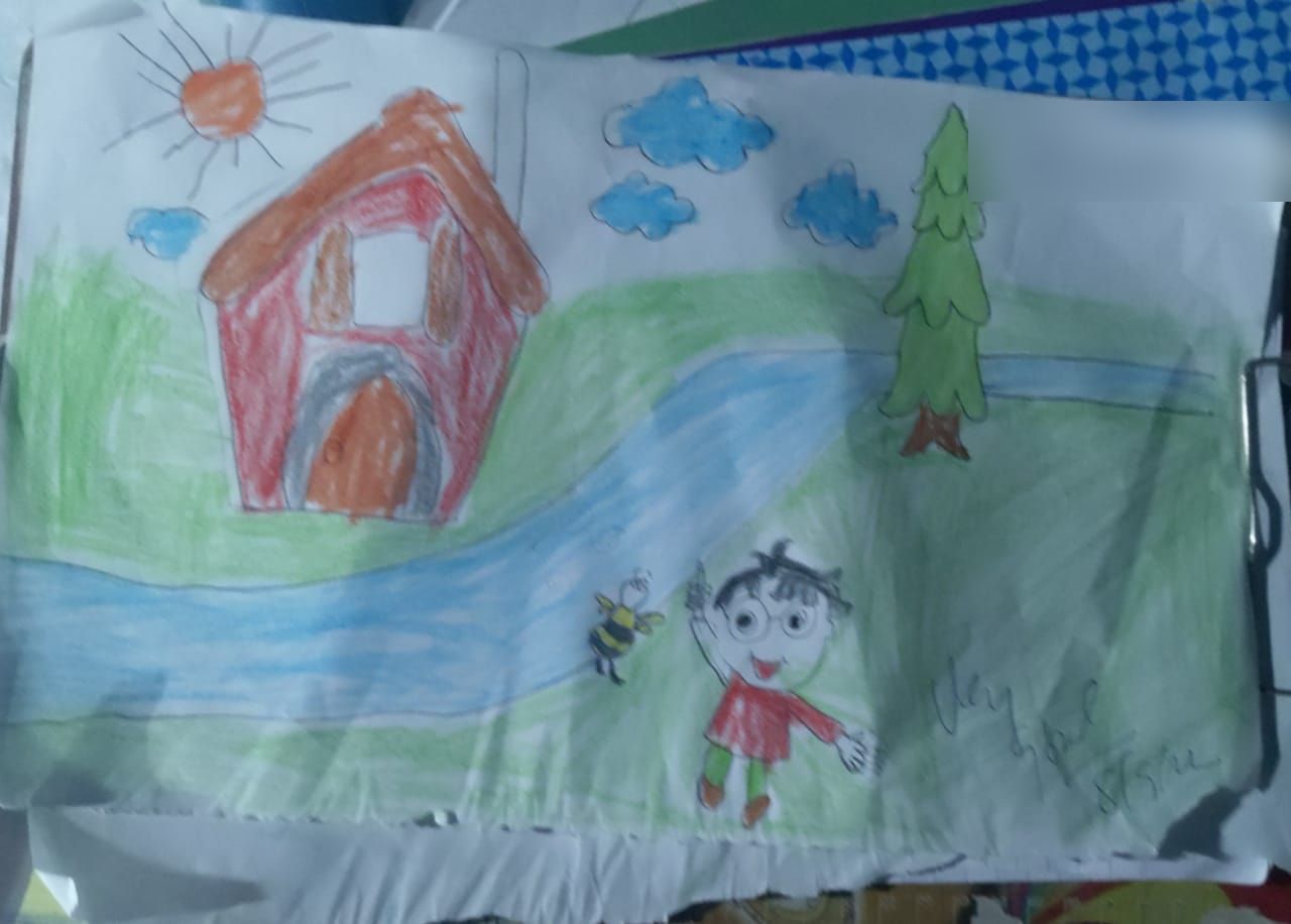A child's crayon drawing of a house by a river under the sun